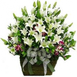 Exotic White Lilies In A Basket